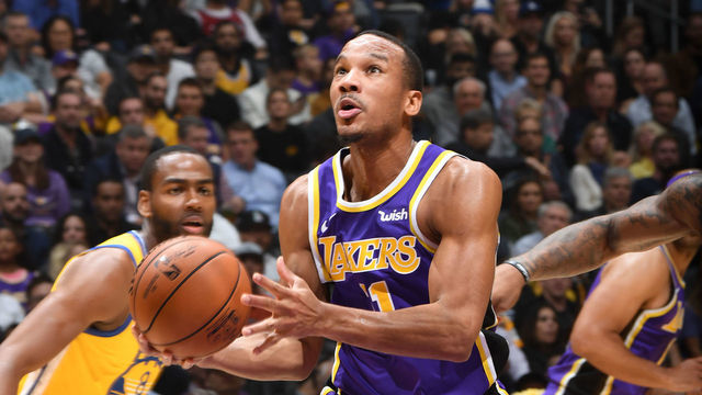 LOS ANGELES, CA - NOVEMBER 13: Avery Bradley #11 of the Los Angeles Lakers handles the ball against the Golden State Warriors on November 13, 2019 at STAPLES Center in Los Angeles, California. NOTE TO USER: User expressly acknowledges and agrees that, by downloading and/or using this Photograph, user is consenting to the terms and conditions of the Getty Images License Agreement. Mandatory Copyright Notice: Copyright 2019 NBAE