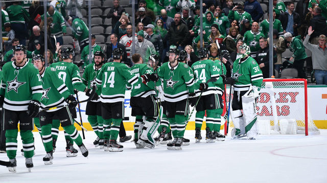 DALLAS, TX - DECEMBER 10: Ben Bishop #30 of the Dallas Stars is congratulated on a shut-out win against the New Jersey Devils at the American Airlines Center on December 10, 2019 in Dallas, Texas.