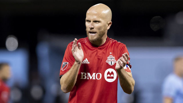 QUEENS, NY - OCTOBER 23: Captain Michael Bradley #4 of Toronto FC claps as he charges up his team during the 2nd half of the 2019 MLS Cup Major League Soccer Eastern Conference Semifinal match between New York City FC and Toronto FC at Citi Field on October 23, 2019 in the Flushing neighborhood of the Queens borough of New York City. Toronto FC won the match with a score of 2 to 1 and advances to the Eastern Conference Finals.