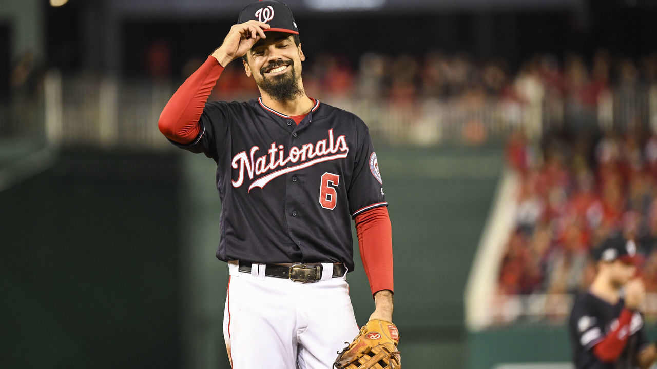 WASHINGTON, DC - OCTOBER 15: Washington Nationals third baseman Anthony Rendon (6) laughs with the St. Louis Cardinals third base coach after a foul ball came in between them in the third inning of Game Four of the NLCS between the Washington Nationals and the St. Louis Cardinals at Nationals Park.