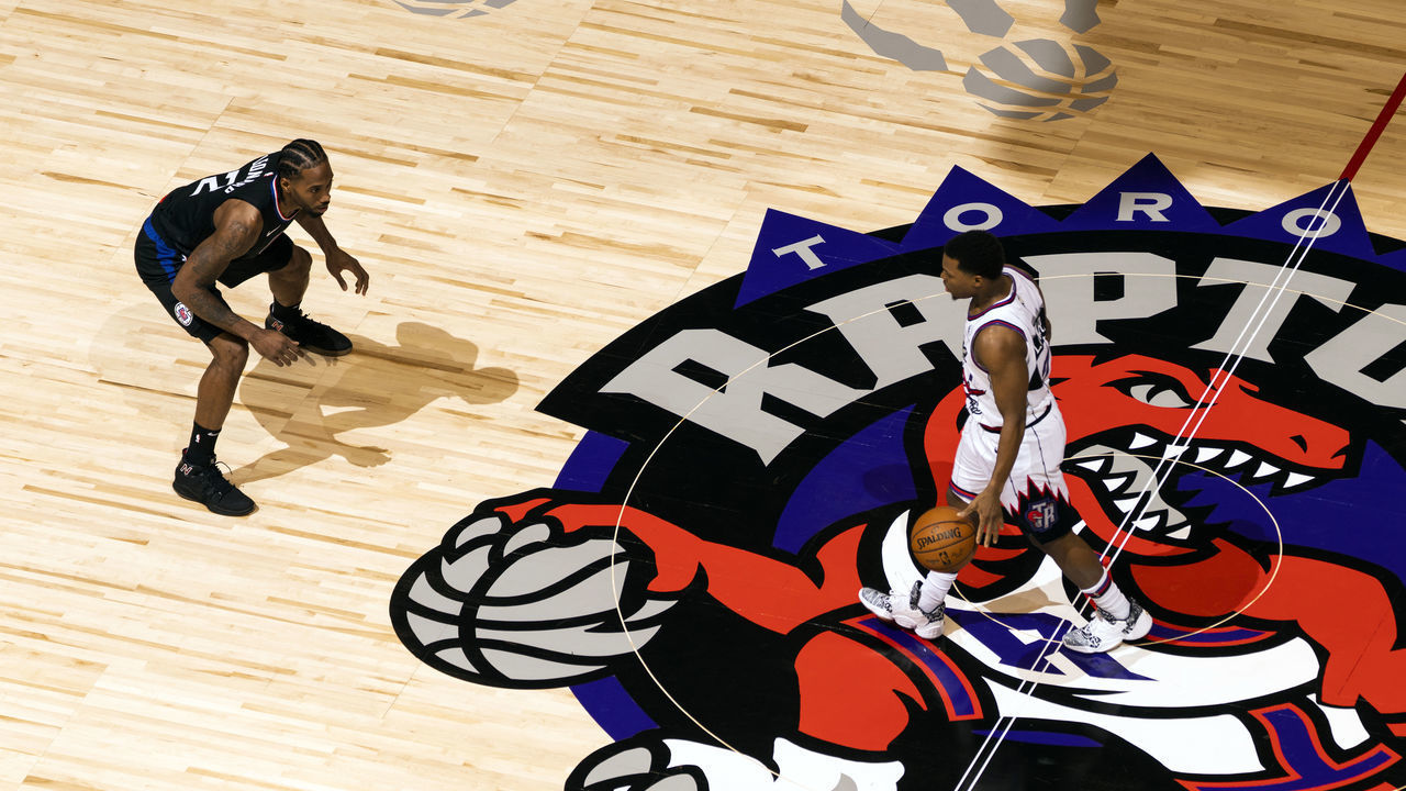 TORONTO, CANADA - DECEMBER 11: Kyle Lowry #7 of the Toronto Raptors handles the ball while Kawhi Leonard #2 of the LA Clippers plays defense during the game on December 11, 2019 at the Scotiabank Arena in Toronto, Ontario, Canada. Mandatory Copyright Notice: Copyright 2019 NBAE