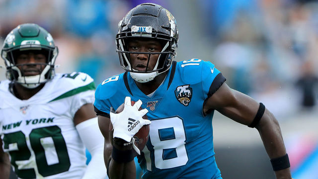 JACKSONVILLE, FLORIDA - OCTOBER 27: Chris Conley #18 of the Jacksonville Jaguars runs for a touchdown during the game against the New York Jets at TIAA Bank Field on October 27, 2019 in Jacksonville, Florida.