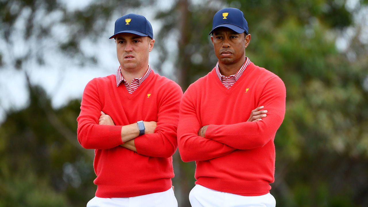 MELBOURNE, AUSTRALIA - DECEMBER 12: Playing Captain Tiger Woods of the United States team and Justin Thomas of the United States team stand on the sixth hole during Thursday four-ball matches on day one of the 2019 Presidents Cup at Royal Melbourne Golf Course on December 12, 2019 in Melbourne, Australia.