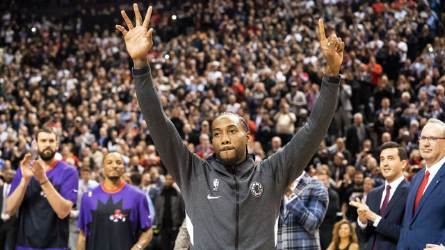 TORONTO, CANADA - DECEMBER 11: Kawhi Leonard #2 of the LA Clippers receives his Championship Ring before the game against the Toronto Raptors on December 11, 2019 at the Scotiabank Arena in Toronto, Ontario, Canada. Mandatory Copyright Notice: Copyright 2019 NBAE