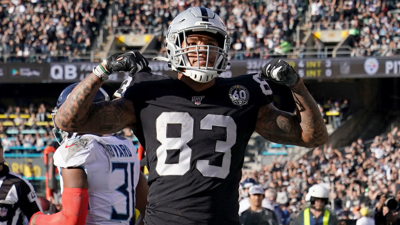 OAKLAND, CALIFORNIA - DECEMBER 08: Darren Waller #83 of the Oakland Raiders reacts after catching a pass and taking it to the two yard line against the Tennessee Titans during the first half of an NFL football game at RingCentral Coliseum on December 08, 2019 in Oakland, California.
