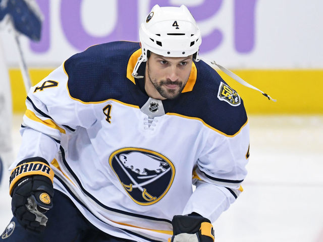 TORONTO, ON - NOVEMBER 30: Buffalo Sabres Defenceman Zach Bogosian (4) in warmups prior to the regular season NHL game between the Buffalo Sabres and Toronto Maple Leafs on November 30, 2019 at Scotiabank Arena in Toronto, ON