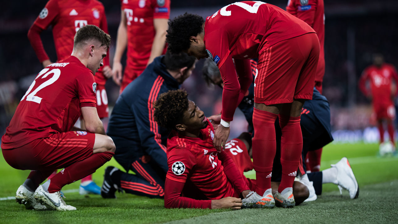 MUNICH, GERMANY - DECEMBER 11: Kingsley Coman of Muenchen is injured during the UEFA Champions League group B match between Bayern Muenchen and Tottenham Hotspur at Allianz Arena on December 11, 2019 in Munich, Germany.