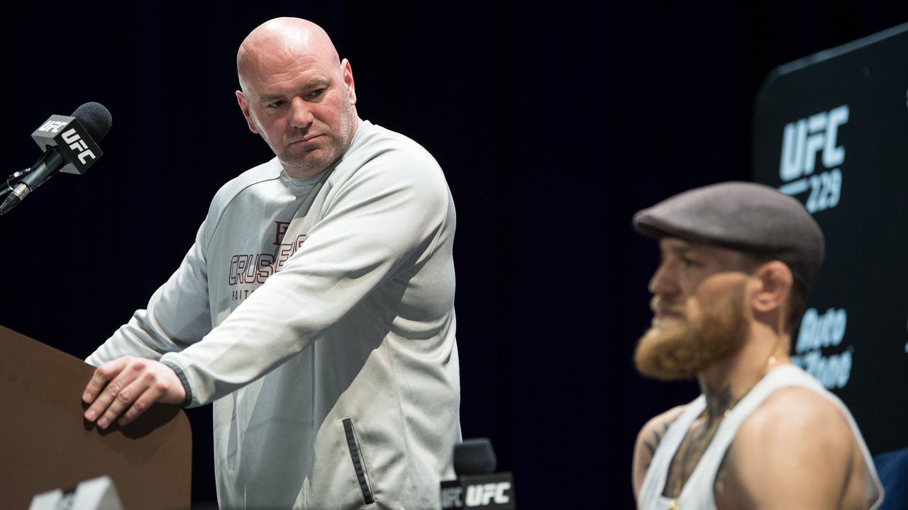 LAS VEGAS, NEVADA - OCTOBER 04: Dana White looks on as Conor McGregor of Ireland speaks during the UFC 229 Press Conference inside The Park Theater at Park MGM on October 4, 2018 in Las Vegas, Nevada.