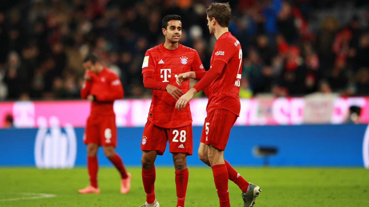 MUNICH, GERMANY - DECEMBER 14: Thomas Muller of FC Bayern Muenchen talks with teammate Sarpreet Singh after the Bundesliga match between FC Bayern Muenchen and SV Werder Bremen at Allianz Arena on December 14, 2019 in Munich, Germany.