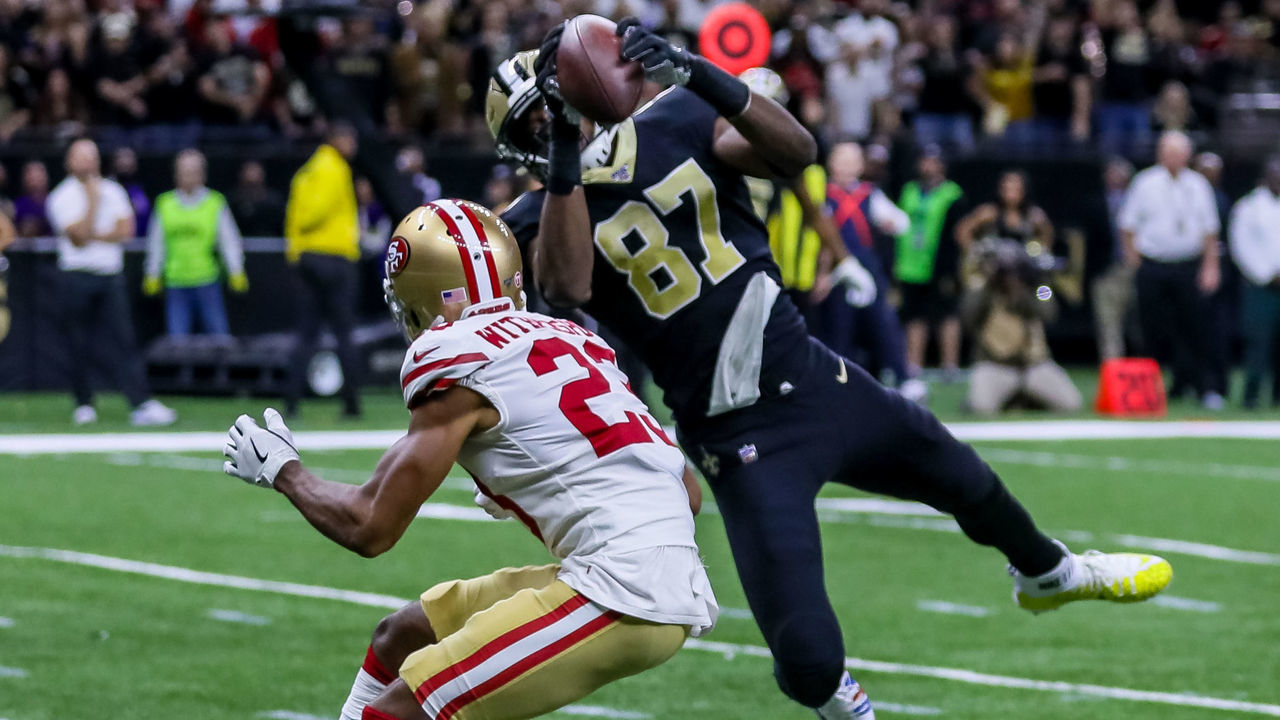 NEW ORLEANS, LA - DECEMBER 08: New Orleans Saints tight end Jared Cook (87) catches a pass for a touchdown against San Francisco 49ers cornerback Ahkello Witherspoon (23) on December 8, 2019 at the Mercedes-Benz Superdome in New Orleans, LA.