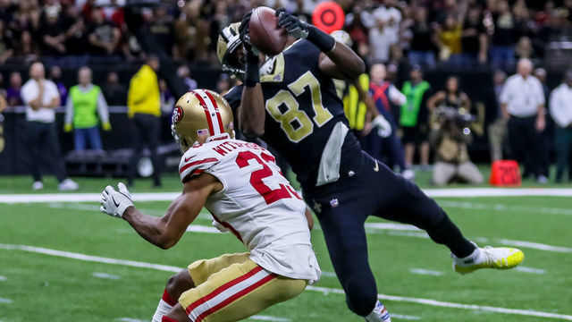 NEW ORLEANS, LA - DECEMBER 08: New Orleans Saints tight end Jared Cook (87) catches a pass for a touchdown against San Francisco 49ers cornerback Ahkello Witherspoon (23) on December 8, 2019 at the Mercedes-Benz Superdome in New Orleans, LA.