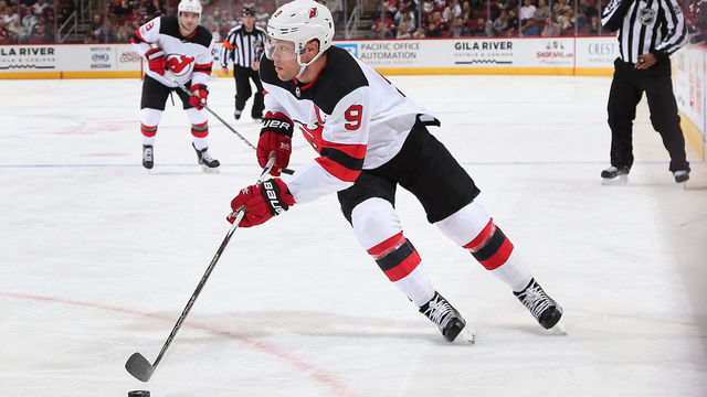 GLENDALE, AZ - DECEMBER 02: Taylor Hall #9 of the New Jersey Devils skates with the puck during the second period of the NHL game against the Arizona Coyotes at Gila River Arena on December 2, 2017 in Glendale, Arizona. The Coyotes defeated the Devils 5-0.