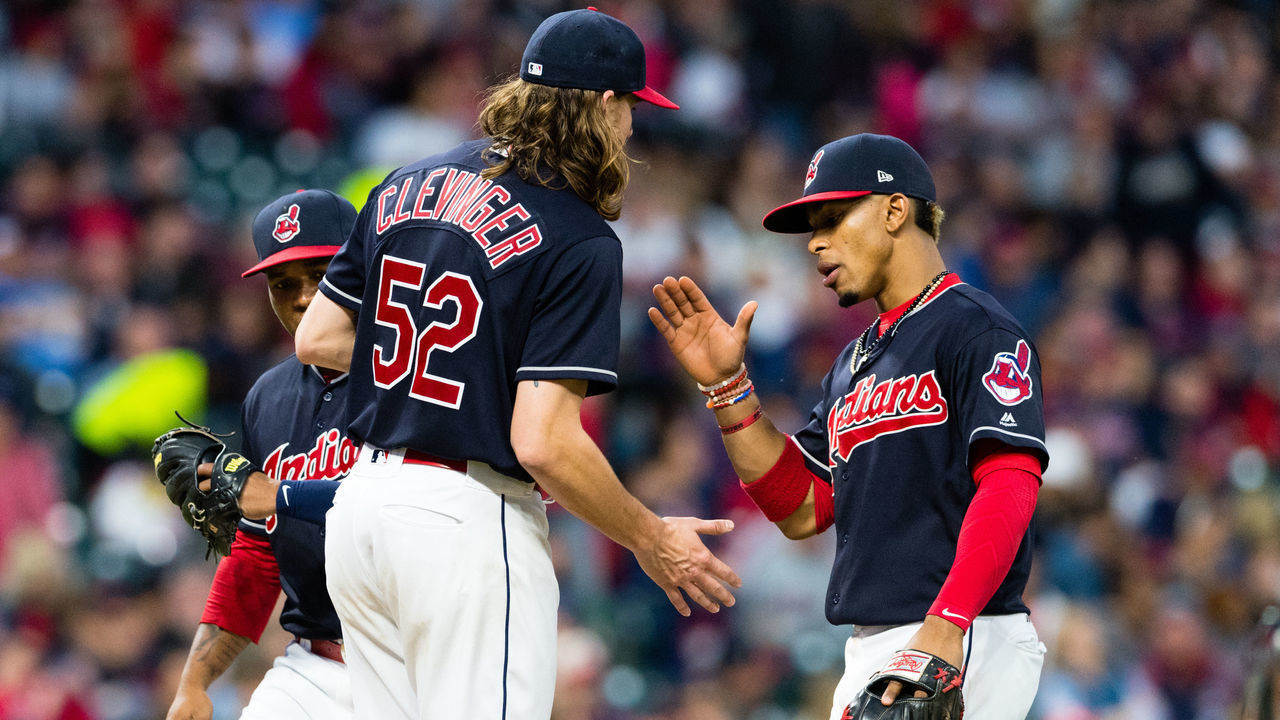 CLEVELAND, OH - MAY 26: Starting pitcher Mike Clevinger #52 celebrates with shortstop Francisco Lindor #12 of the Cleveland Indians as Clevenger leaves the game during the sixth inning against the Kansas City Royals at Progressive Field on May 26, 2017 in Cleveland, Ohio.