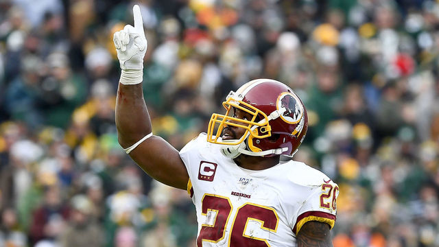 GREEN BAY, WISCONSIN - DECEMBER 08: Running back Adrian Peterson #26 of the Washington Redskins celebrates rushing for a touchdown in the second quarter of the game against the Green Bay Packers at Lambeau Field on December 08, 2019 in Green Bay, Wisconsin.