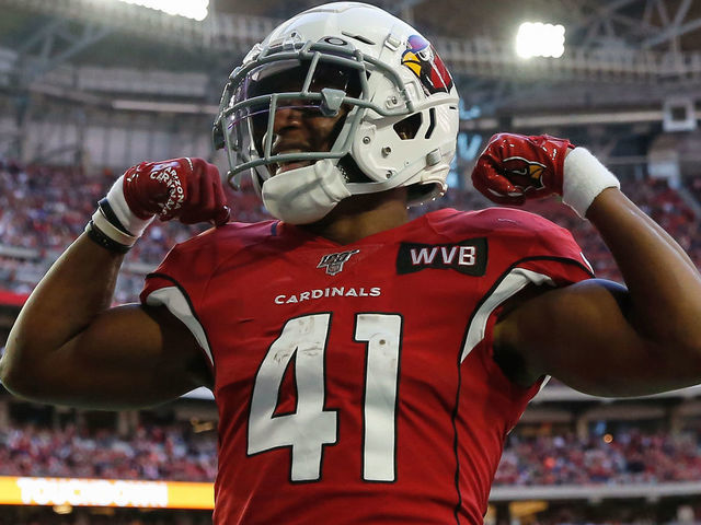 GLENDALE, AZ - DECEMBER 15: Arizona Cardinals running back Kenyan Drake (41) flexes after scoring a touchdown during the NFL football game between the Cleveland Browns and the Arizona Cardinals on December 15, 2019 at State Farm Stadium in Glendale, Arizona.