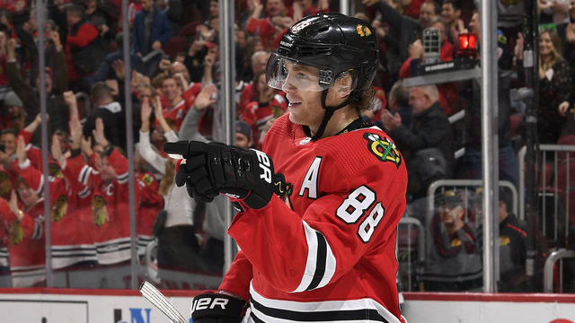 CHICAGO, IL - DECEMBER 15: Patrick Kane #88 of the Chicago Blackhawks reacts after scoring a hat-trick in the third period against the Minnesota Wild at the United Center on December 15, 2019 in Chicago, Illinois.