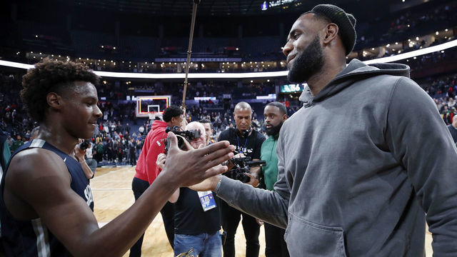 COLUMBUS, OH - DECEMBER 14: LeBron 'Bronny' James Jr. #0 of Sierra Canyon High School is greeted by his father LeBron James of the Los Angeles Lakers following the Ohio Scholastic Play-By-Play Classic against St. Vincent-St. Mary High School at Nationwide Arena on December 14, 2019 in Columbus, Ohio.