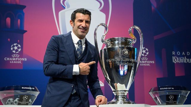 Portuguese former player Luis Figo poses with the UEFA Champions League trophy prior to the UEFA Champions League football cup round of 16 draw ceremony on December 16, 2019 in Nyon.