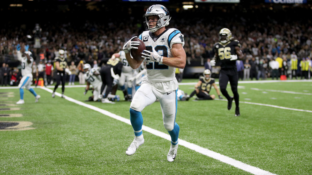 NEW ORLEANS, LOUISIANA - NOVEMBER 24: Christian McCaffrey #22 of the Carolina Panthers scores a 1 yard touchdown against the New Orleans Saints during the second quarter in the game at Mercedes Benz Superdome on November 24, 2019 in New Orleans, Louisiana.