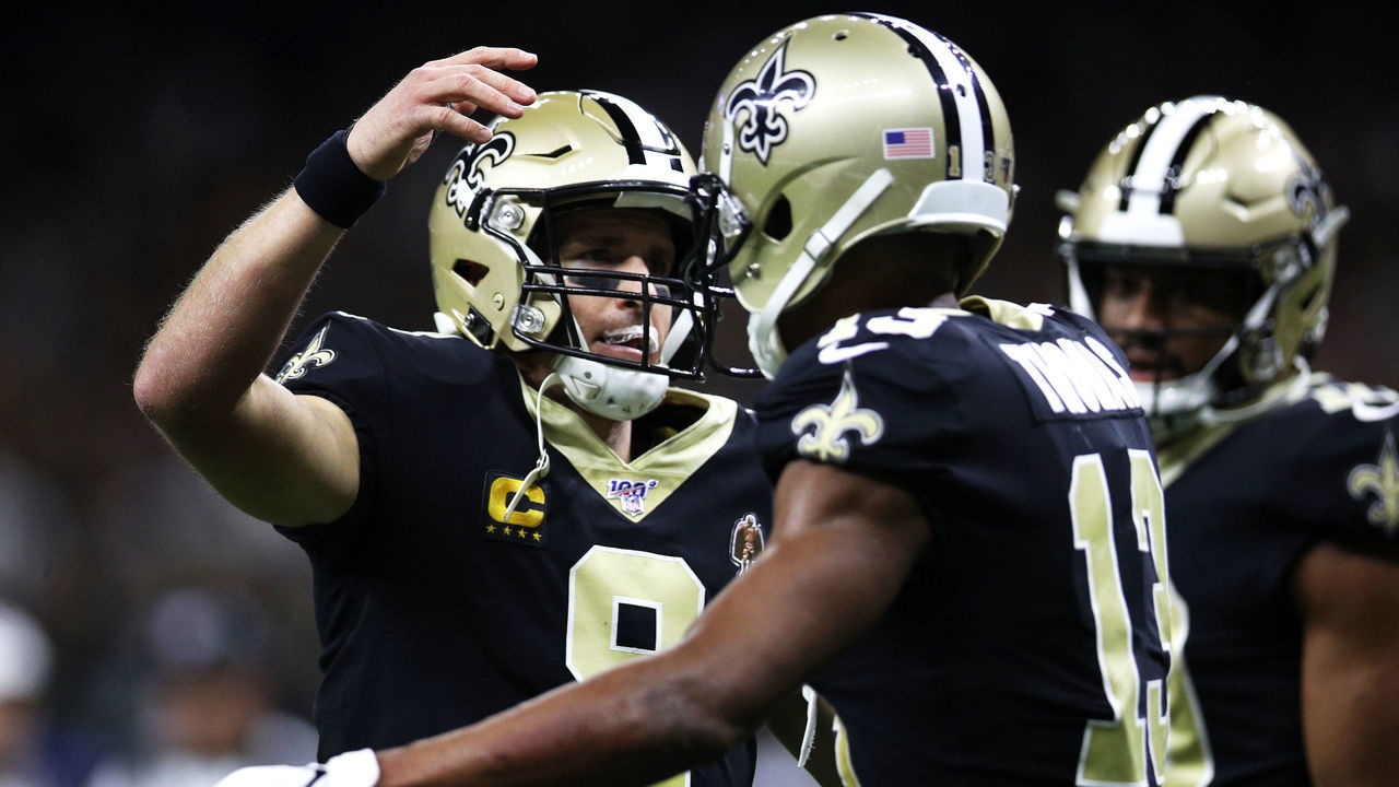 NEW ORLEANS, LOUISIANA - DECEMBER 16: Quarterback Drew Brees #9 of the New Orleans Saints congratulates wide receiver Michael Thomas #13 on a touchdown in the second quarter of the game against the Indianapolis Colts at Mercedes Benz Superdome on December 16, 2019 in New Orleans, Louisiana.