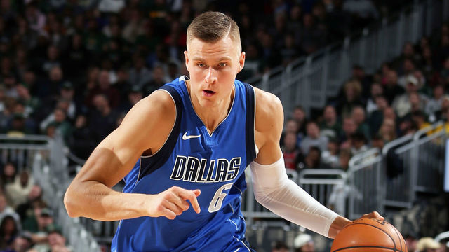 MILWAUKEE, WI - DECEMBER 16: Kristaps Porzingis #6 of the Dallas Mavericks drives to the basket during the game against the Milwaukee Bucks on December 16, 2019 at the Fiserv Forum Center in Milwaukee, Wisconsin. Mandatory Copyright Notice: Copyright 2019 NBAE .