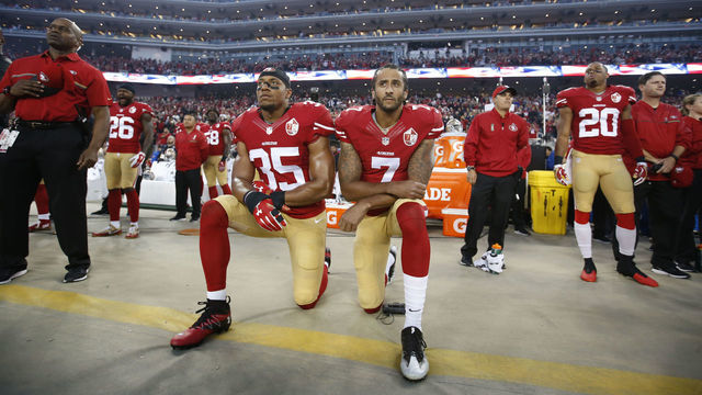 SANTA CLARA, CA - SEPTEMBER 12: Eric Reid #35 and Colin Kaepernick #7 of the San Francisco 49ers kneel during the anthem prior to the game against the Los Angeles Rams at Levi Stadium on September 12, 2016 in Santa Clara, California. The 49ers defeated the Rams 28-0. *** Local Caption ***