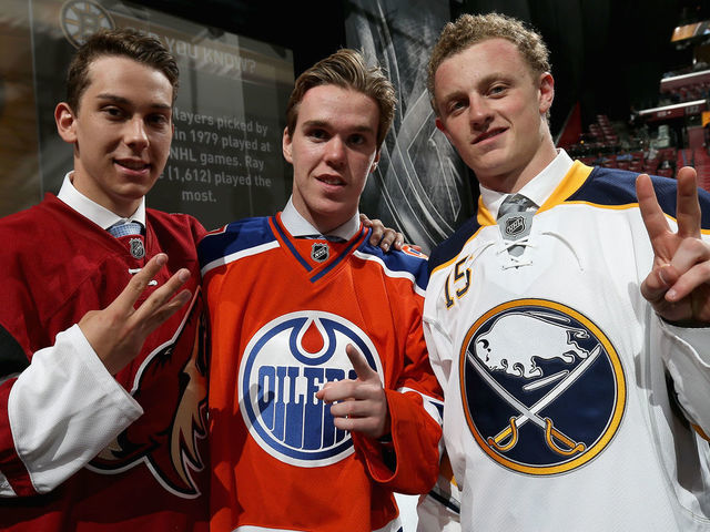 SUNRISE, FL - JUNE 26: (L-R) Third overall pick Dylan Strome of the the Arizona Coyotes, first overall pick Connor McDavid of the Edmonton Oilers and second overall pick Jacck Eichel of the Buffalo Sabres pose together during Round One of the 2015 NHL Draft at BB&T Center on June 26, 2015 in Sunrise, Florida.