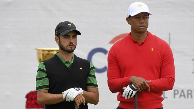 VICTORIA , AUSTRALIA - DECEMBER 15: International Teams Abraham Ancer of Mexico and U.S. Team Captain Tiger Woods look on at the 1st tee during the final round singles matches at the Presidents Cup at The Royal Melbourne Golf Club on December 15, 2019, in Victoria , Australia.