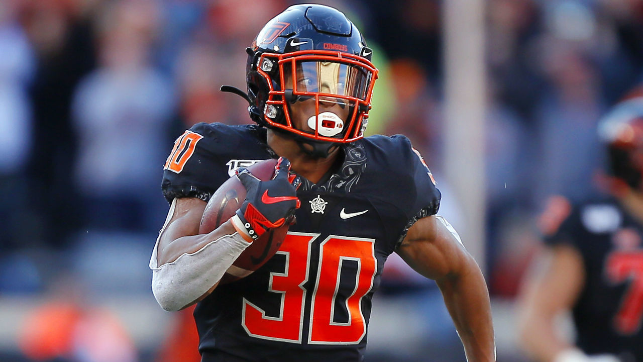 STILLWATER, OK - NOVEMBER 2: Running back Chuba Hubbard #30 of the Oklahoma State Cowboys runs for a 62-yard touchdown against the TCU Horned Frogs in the fourth quarter on November 2, 2019 at Boone Pickens Stadium in Stillwater, Oklahoma. Hubbard had 223 yards in the game as OSU won 34-27.