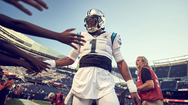 CHICAGO, IL - AUGUST 08: Carolina Panthers quarterback Cam Newton (1) high fives young fans prior to game action during a NFL preseason game between the Carolina Panthers and the Chicago Bears on August 8, 2019 at Soldier Field, in Chicago, IL.