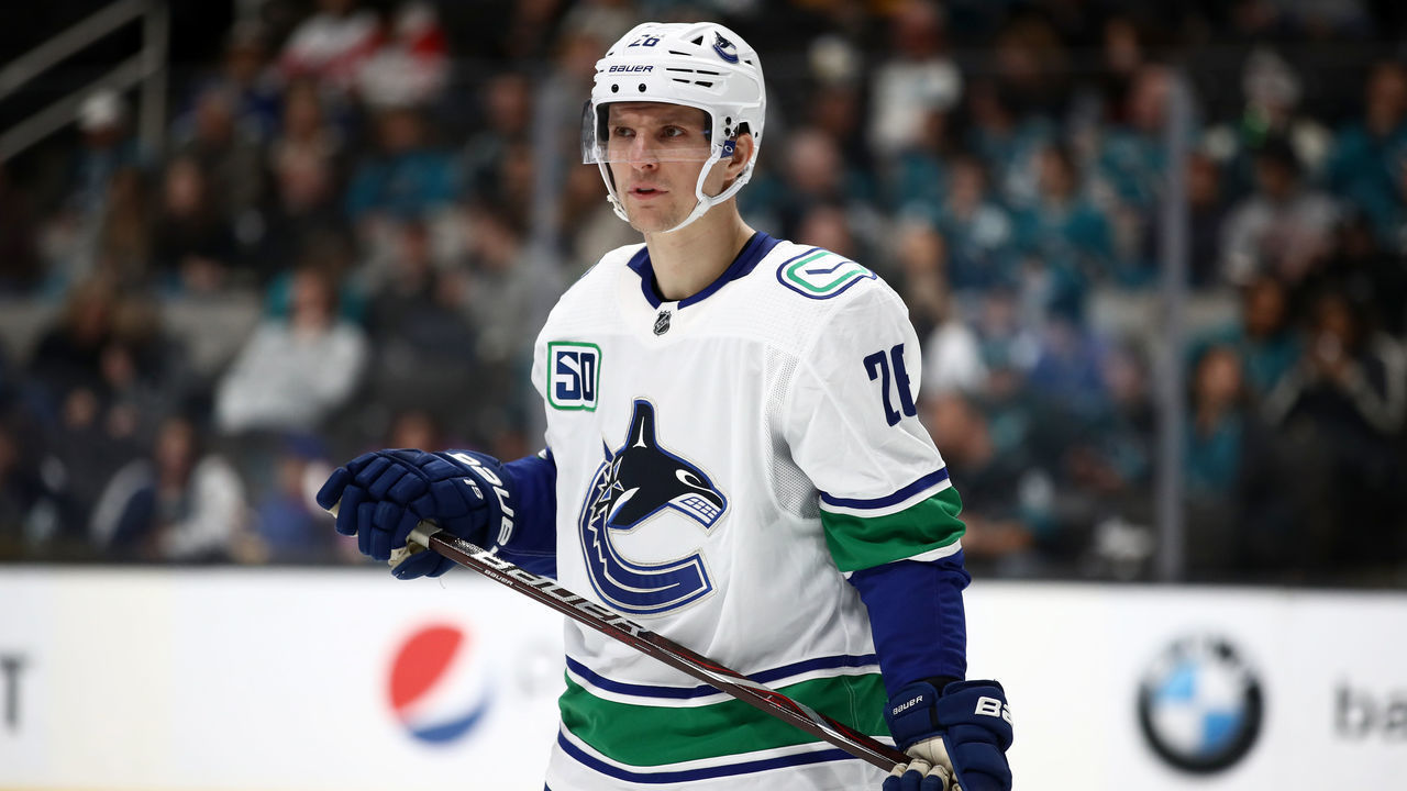 SAN JOSE, CALIFORNIA - DECEMBER 14: Antoine Roussel #26 of the Vancouver Canucks stands on the ice during their game against the San Jose Sharks at SAP Center on December 14, 2019 in San Jose, California.