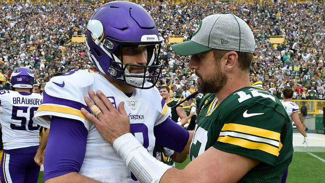 GREEN BAY, WISCONSIN - SEPTEMBER 15: Kirk Cousins #8 of the Minnesota Vikings and Aaron Rodgers #12 of the Green Bay Packers shakes hands after the game at Lambeau Field on September 15, 2019 in Green Bay, Wisconsin.