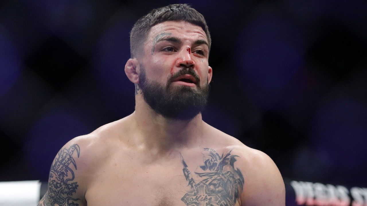 LAS VEGAS, NEVADA - DECEMBER 14: Mike Perry stands in the Octagon after losing to Geoff Neal in a welterweight fight during UFC 245 at T-Mobile Arena on December 14, 2019 in Las Vegas, Nevada. Neal won the fight with a first-round TKO.