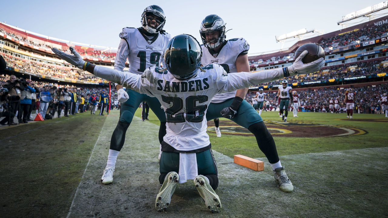 LANDOVER, MD - DECEMBER 15: Miles Sanders #26 of the Philadelphia Eagles celebrates with J.J. Arcega-Whiteside #19 and Dallas Goedert #88 after catching a pass for a touchdown against the Washington Redskins during the second half at FedExField on December 15, 2019 in Landover, Maryland.