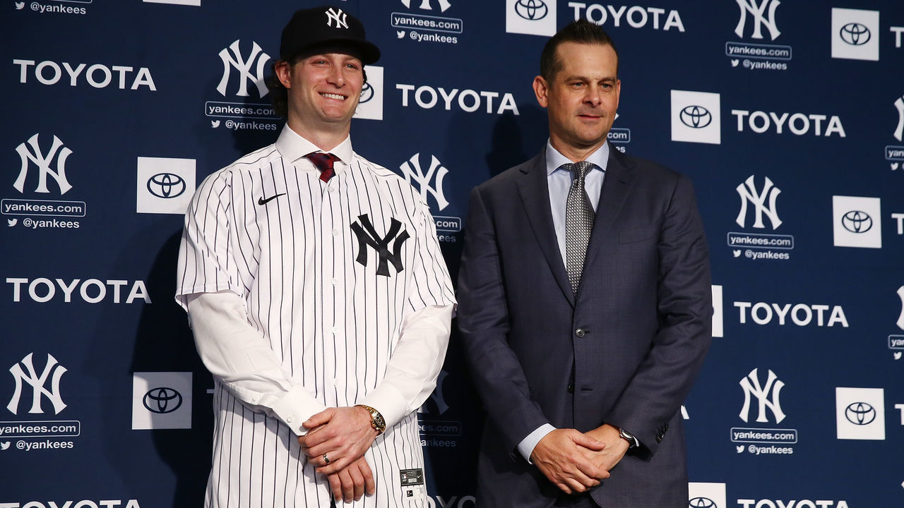 NEW YORK, NEW YORK - DECEMBER 18: Gerrit Cole and Aaron Boone, manager of the New York Yankees pose for a photo at Yankee Stadium during a press conference at Yankee Stadium on December 18, 2019 in New York City.