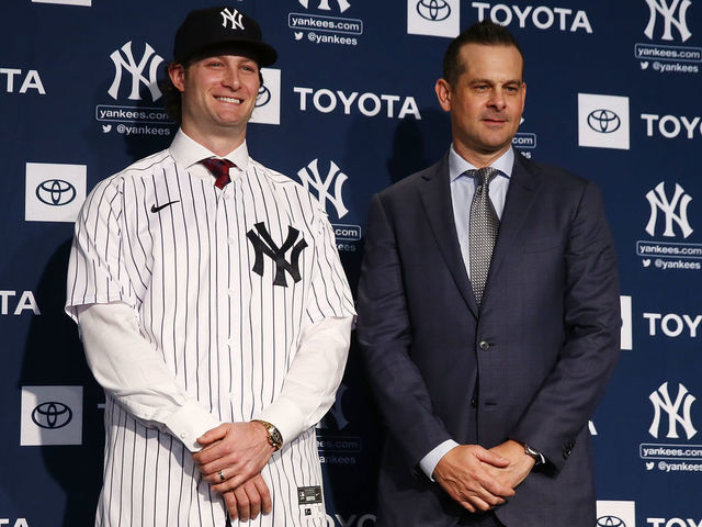 NEW YORK, NEW YORK - DECEMBER 18: Gerrit Cole and Aaron Boone, manager of the New York Yankees pose for a photo at Yankee Stadium during a press conference at Yankee Stadium on December 18, 2019 in New York City.