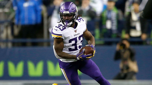 SEATTLE, WASHINGTON - DECEMBER 02: Running back Dalvin Cook #33 of the Minnesota Vikings carries the ball against the defense oat CenturyLink Field on December 02, 2019 in Seattle, Washington.