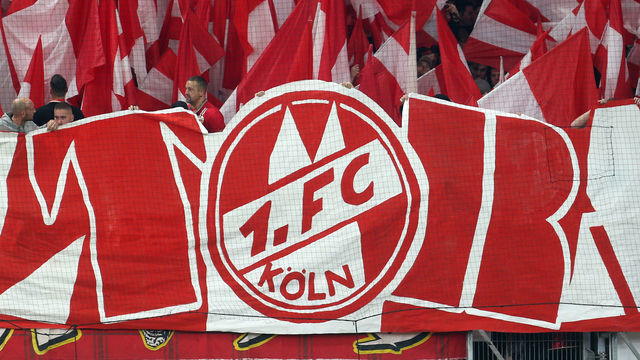 25 October 2019, Rhineland-Palatinate, Mainz: Soccer: Bundesliga, FSV Mainz 05 - 1st FC Cologne, 9th matchday in the Opel Arena. Cologne fans. Photo: Thomas Frey/dpa - IMPORTANT NOTE: In accordance with the requirements of the DFL Deutsche Fußball Liga or the DFB Deutscher Fußball-Bund, it is prohibited to use or have used photographs taken in the stadium and/or the match in the form of sequence images and/or video-like photo sequences.