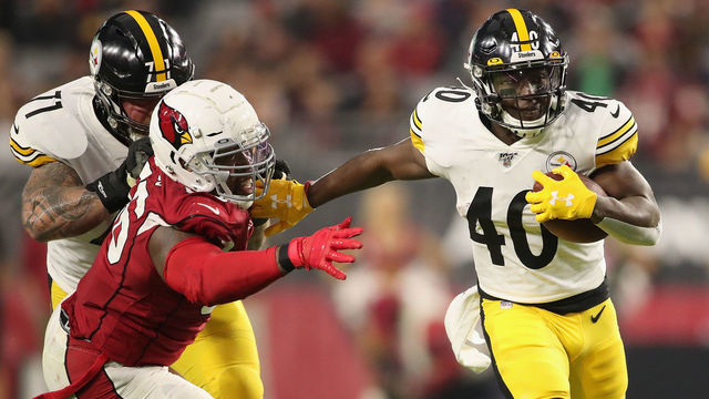 GLENDALE, ARIZONA - DECEMBER 08: Running back Kerrith Whyte #40 of the Pittsburgh Steelers rushes the football against the Arizona Cardinals during the NFL game at State Farm Stadium on December 08, 2019 in Glendale, Arizona. The Steelers defeated the Cardinals 23-17.