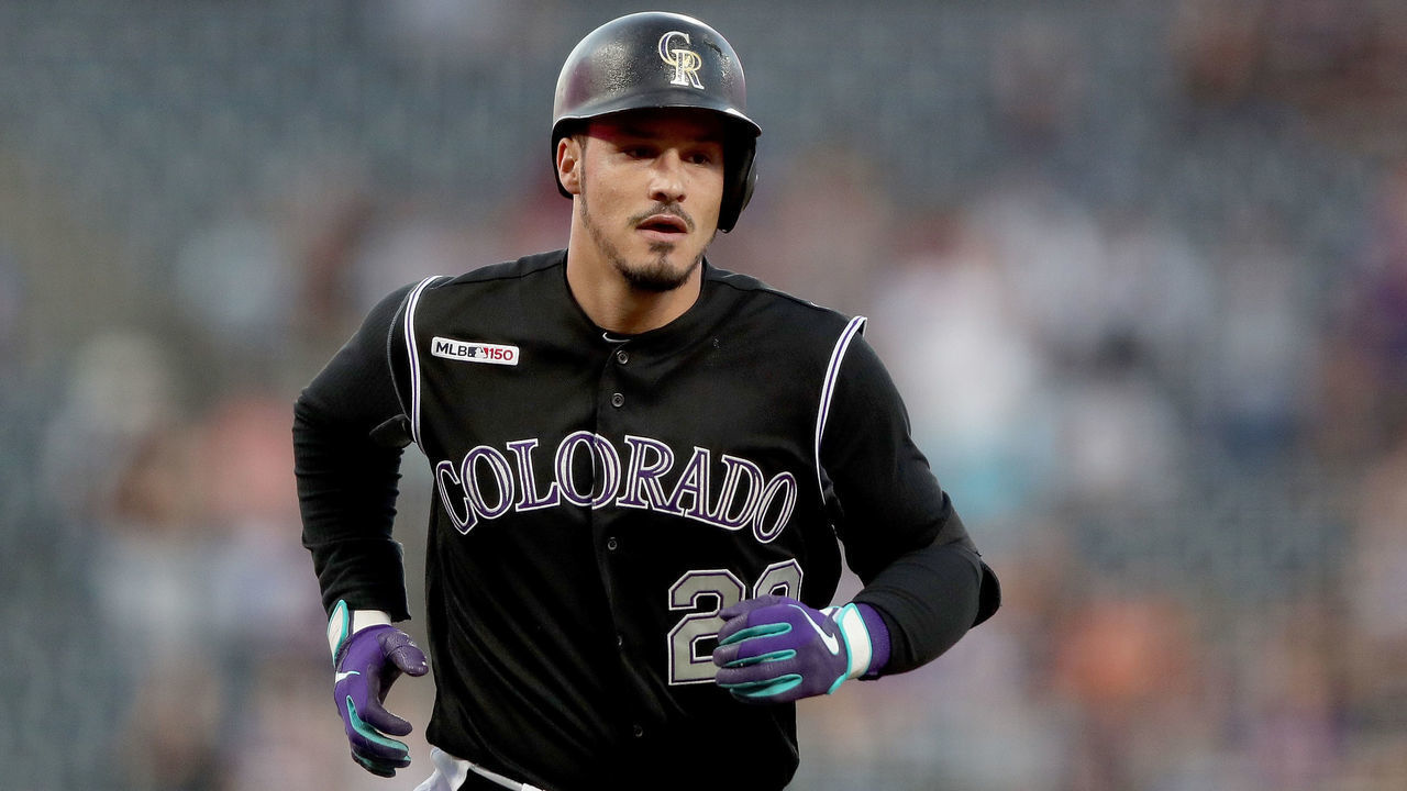 DENVER, COLORADO - SEPTEMBER 13: Nolan Arenado #28 of the Colorado Rockies circles the bases after hitting a 2 RBI home run in the first inning against the San Diego Padres at Coors Field on September 13, 2019 in Denver, Colorado.