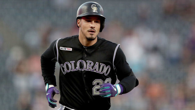 DENVER, COLORADO - SEPTEMBER 13: Nolan Arenado #28 of the Colorado Rockies circles the bases after hitting a 2 RBI home run in the first inning against the San Diego Padres at Coors Field on September 13, 2019 in Denver, Colorado.