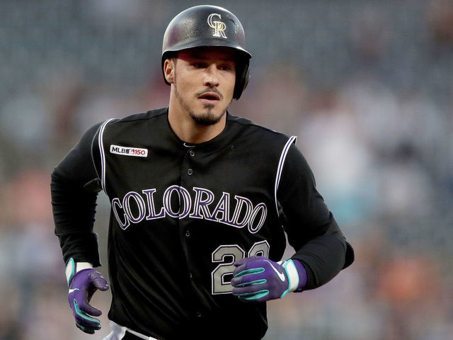 DENVER, COLORADO - SEPTEMBER 13: Nolan Arenado #28 of the Colorado Rockies circles the bases after hitting a 2 RBI home run in the first inning against the San Diego Padres at Coors Field on September 13, 2019 in Denver, Colorado.