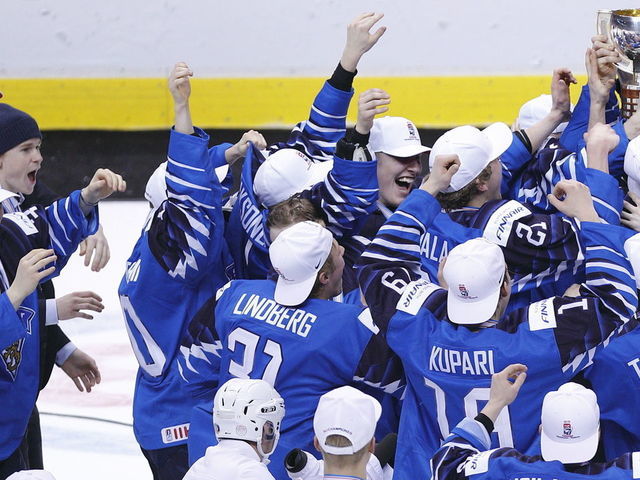 VANCOUVER , BC - JANUARY 5: Finland celebrates with the trophy after a victory against the United States following the gold medal game at the IIHF World Junior Championships at Rogers Arena on January 5, 2019 in Vancouver, British Columbia, Canada.