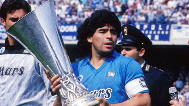 UNSPECIFIED, ITALY - UNDATED: Diego Armando Maradona holds up a trophy in this undated photo in Italy.