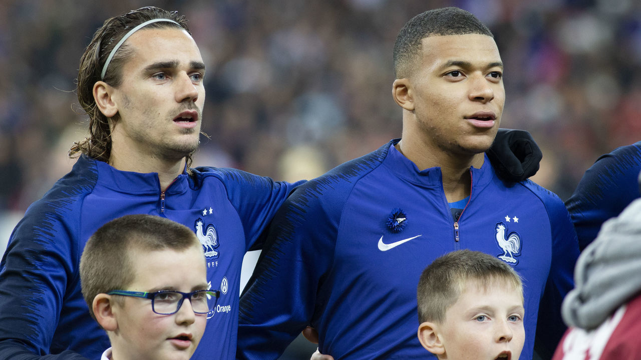 PARIS, FRANCE - November 14: Antoine Griezmann #7 of France and Kylian Mbappe #10 of France during the singing of the national anthem before the France V Moldova, 2020 European Championship qualifying group H match at Stade de France on November 14th 2019 in Paris, France