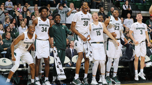 EAST LANSING, MI - DECEMBER 21: Michigan State Spartans bench reacts to play late in the second half of a game against the Eastern Michigan Eagles at Breslin Center on December 21, 2019 in East Lansing, Michigan.