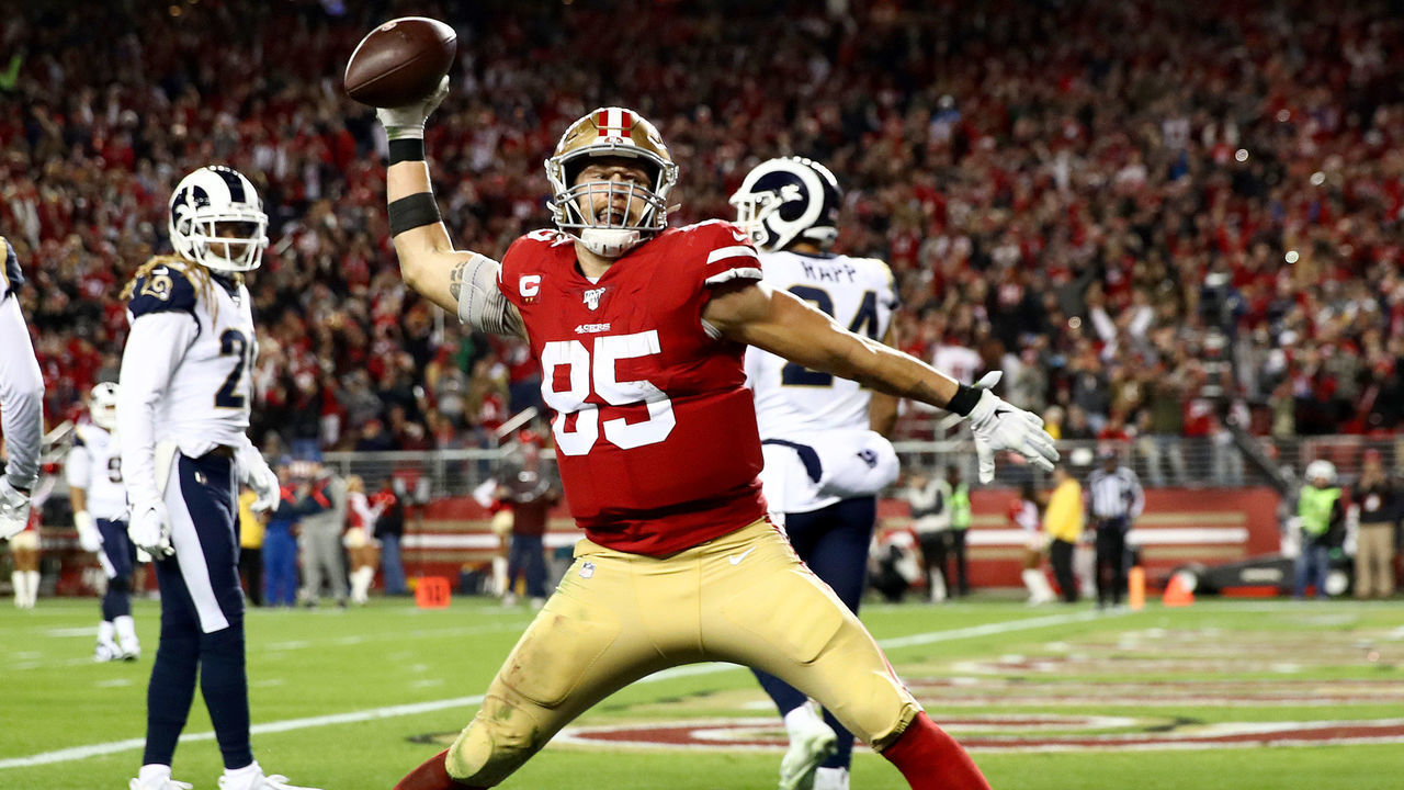 SANTA CLARA, CALIFORNIA - DECEMBER 21: Tight end George Kittle #85 of the San Francisco 49ers spikes the ball after his fourth quarter touchdown over the Los Angeles Rams at Levi's Stadium on December 21, 2019 in Santa Clara, California.
