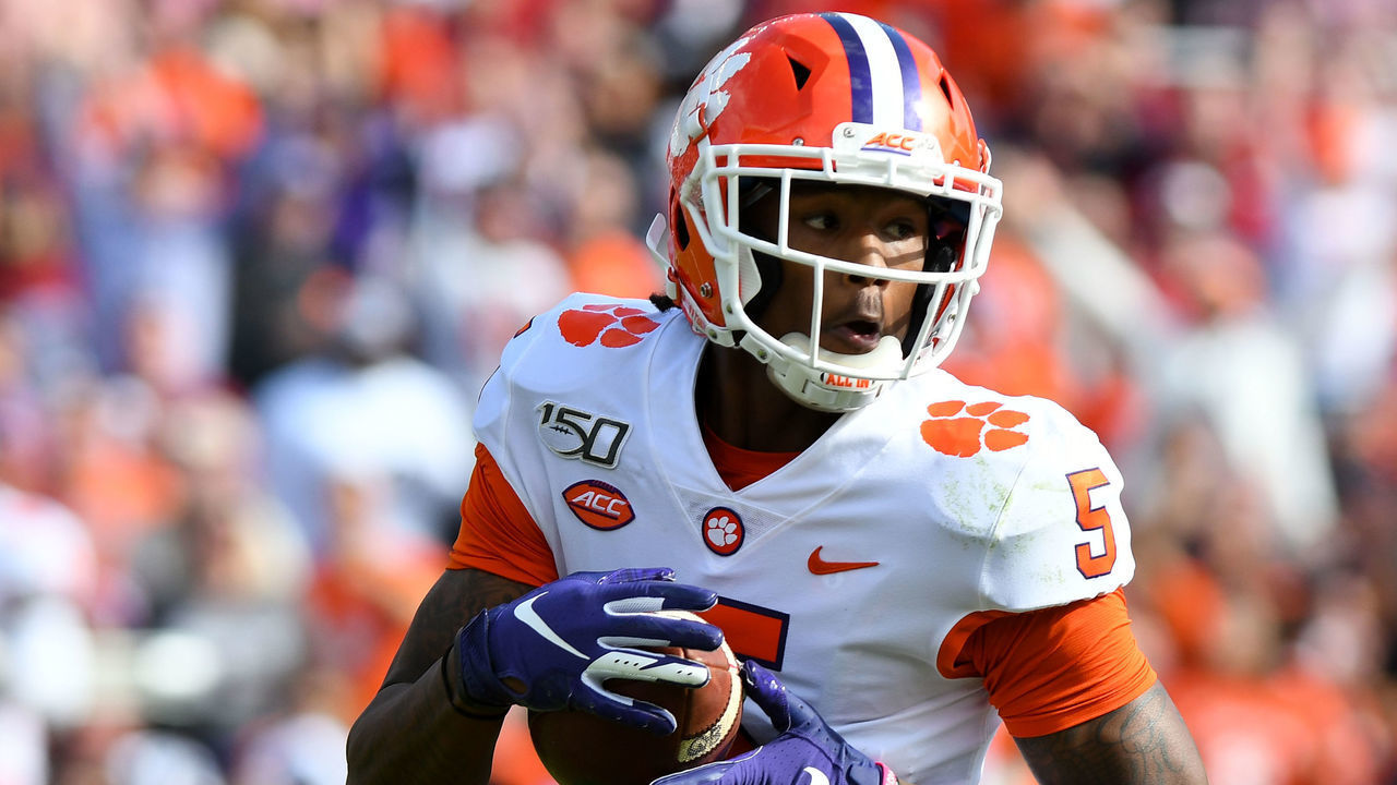 COLUMBIA, SC - NOVEMBER 30: Clemson Tigers wide receiver Tee Higgins (5) make the cat and turns to see where the defender is as he crosses the goal line for a touchdown during the game between the Clemson Tigers and the South Carolina Gamecocks on November 30, 2019 at Williams-Brice Stadium in Columbia, South Carolina.