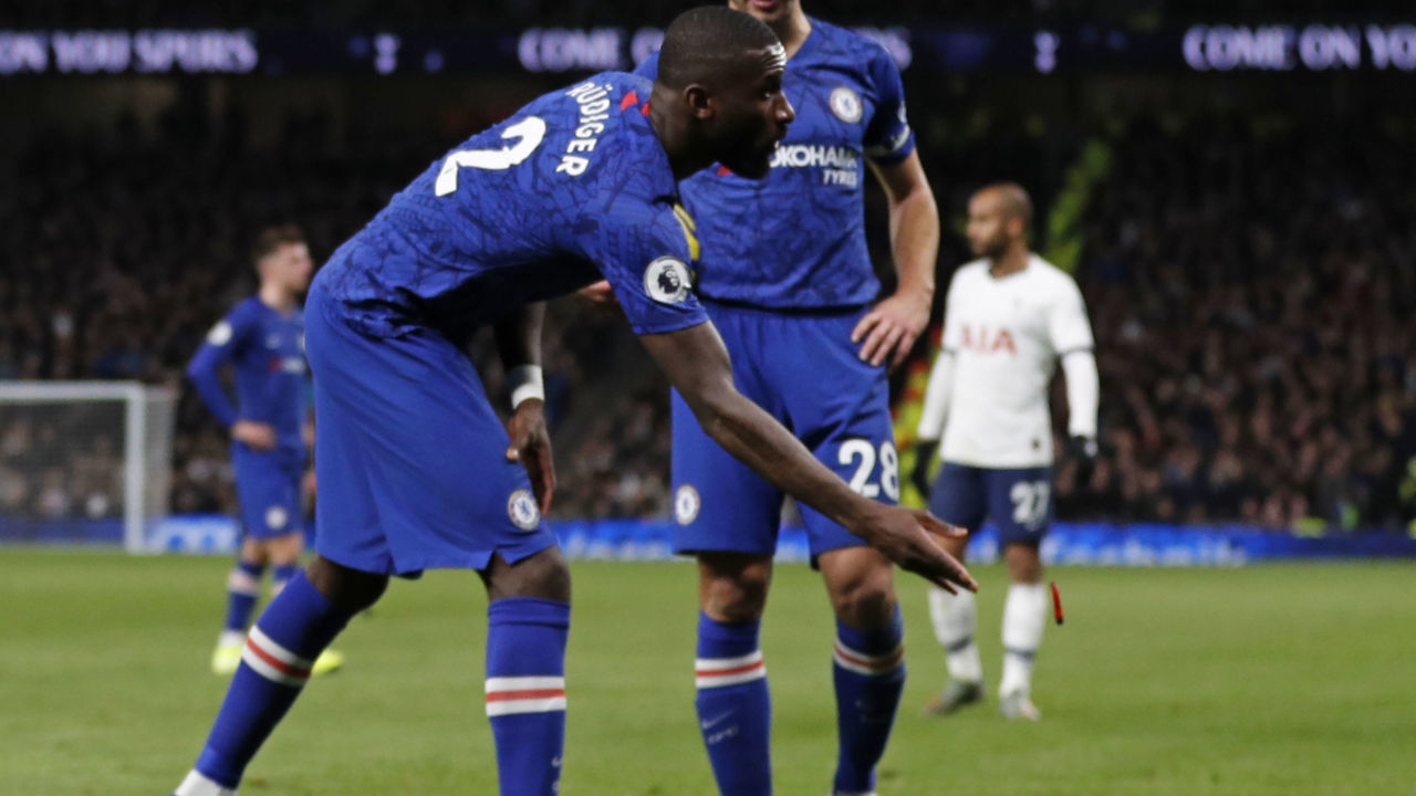 Chelsea's German defender Antonio Rudiger throws an object off the playing surface during the English Premier League football match between Tottenham Hotspur and Chelsea at Tottenham Hotspur Stadium in London, on December 22, 2019.