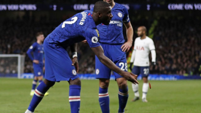 Chelsea's German defender Antonio Rudiger throws an object off the playing surface during the English Premier League football match between Tottenham Hotspur and Chelsea at Tottenham Hotspur Stadium in London, on December 22, 2019.